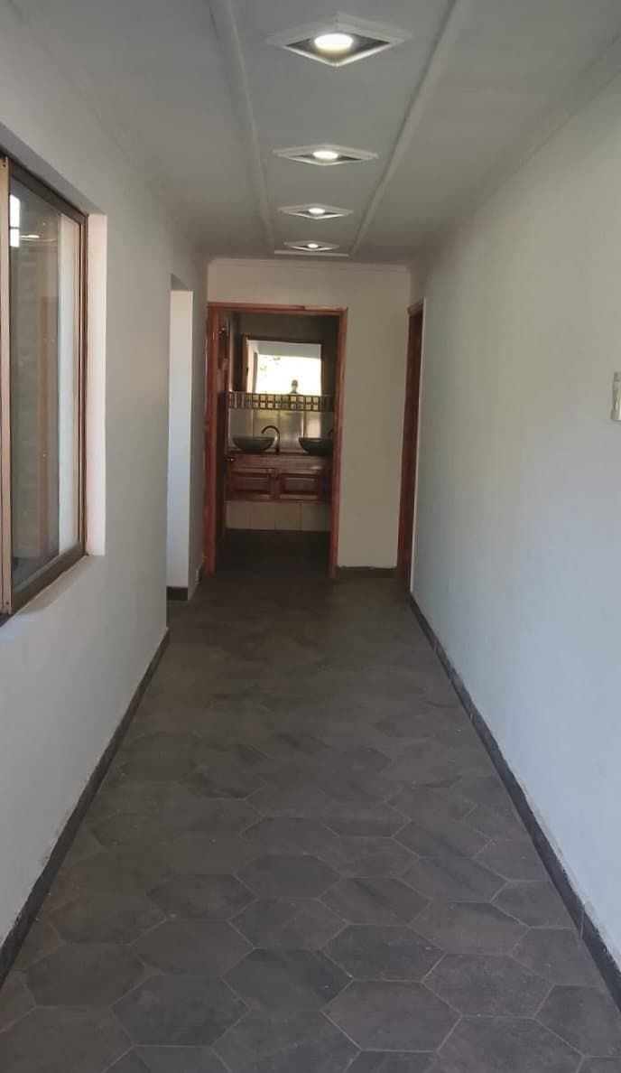 Pasillo interior que conduce a las habitaciones